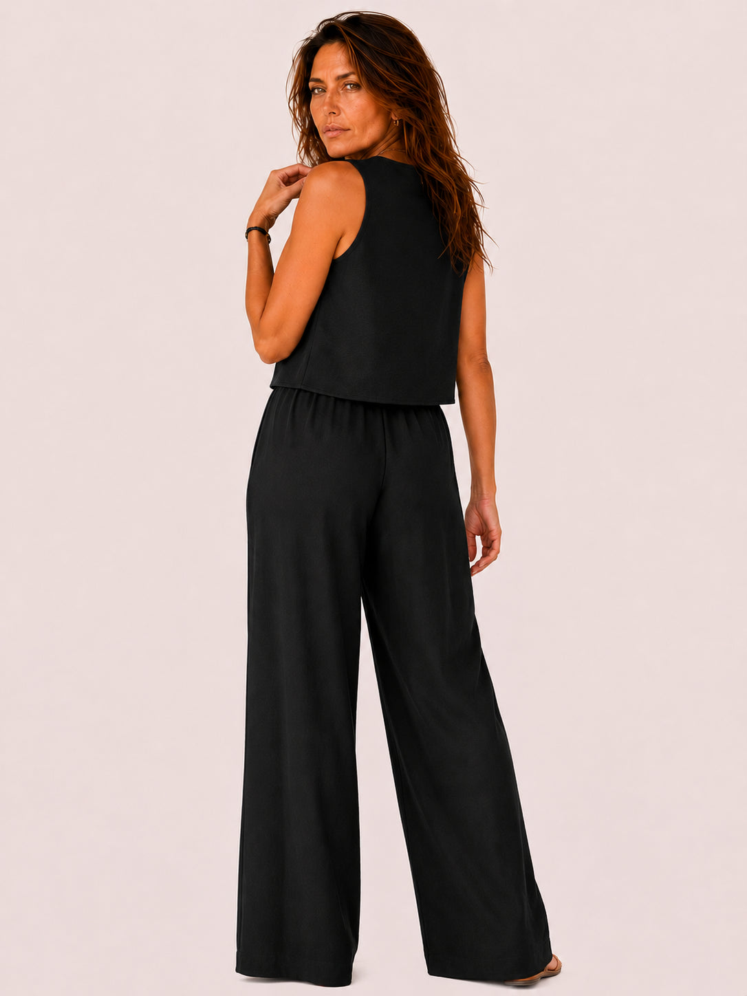 Completo senza maniche con pantaloni palazzo